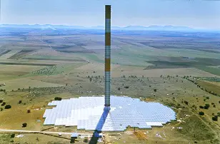 Solar updraft tower using hot air turbines